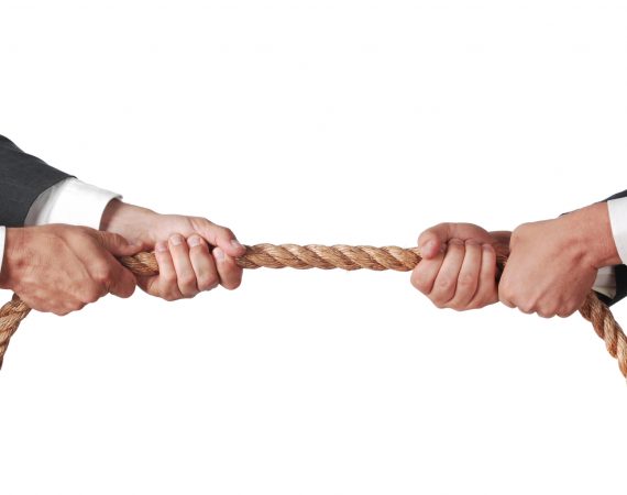 tug of war between businessmen